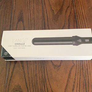 Lange curling wand, never used, in box.